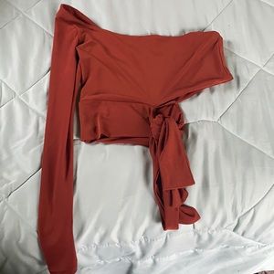 Reddish/orange shirt